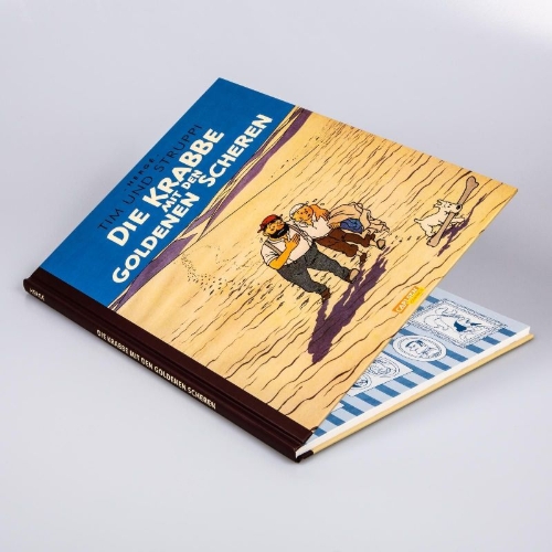 Buchcover und Innenansicht für das Buch: TINTIN: LE CRABE AUX PINCES D'OR                           