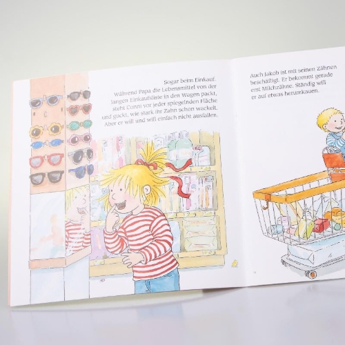Buchcover und Innenansicht für das Buch: Conni und der Wackelzahn