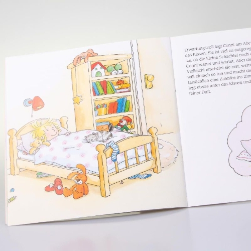 Buchcover und Innenansicht für das Buch: Conni und der Wackelzahn