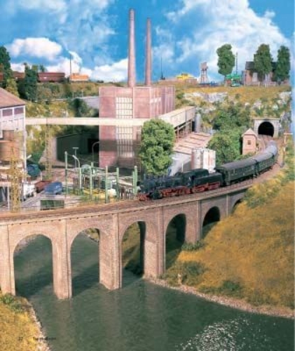 Buchcover und Innenansicht für das Buch: Traumanlagen von Modellbahnprofis