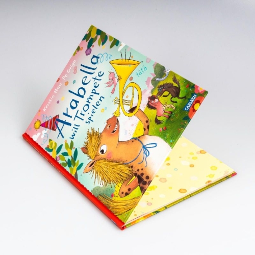 Buchcover und Innenansicht für das Buch: Arabella will Trompete spielen