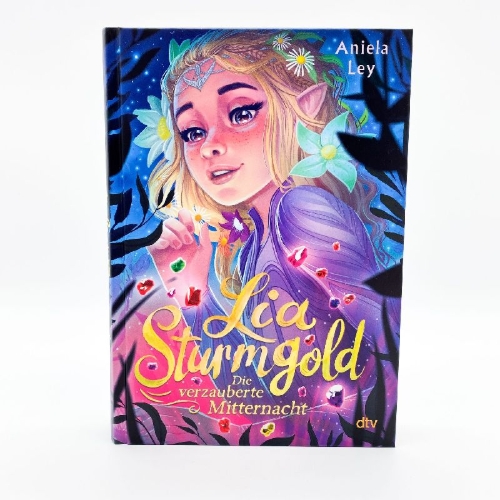 Buchcover und Innenansicht für das Buch: Lia Sturmgold - Die verzauberte Mitternacht