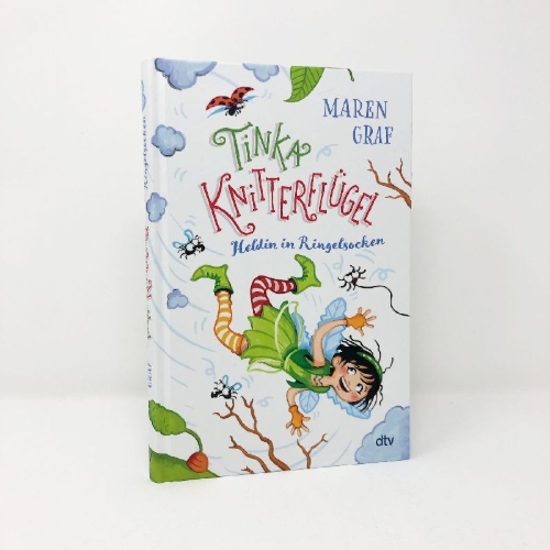 Buchcover und Innenansicht für das Buch: Tinka Knitterflügel - Heldin in Ringelsocken