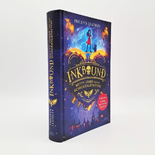 Buchcover und Innenansicht für das Buch: Inkbound. Meticulous Jones and the Skull Tattoo