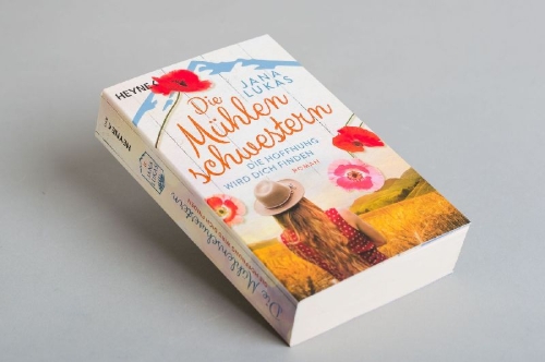 Buchcover und Innenansicht für das Buch: Die Mühlenschwestern - Die Hoffnung wird dich finden