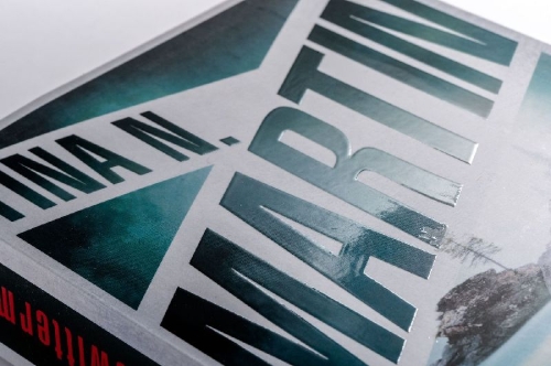 Buchcover und Innenansicht für das Buch: Åskmakaren