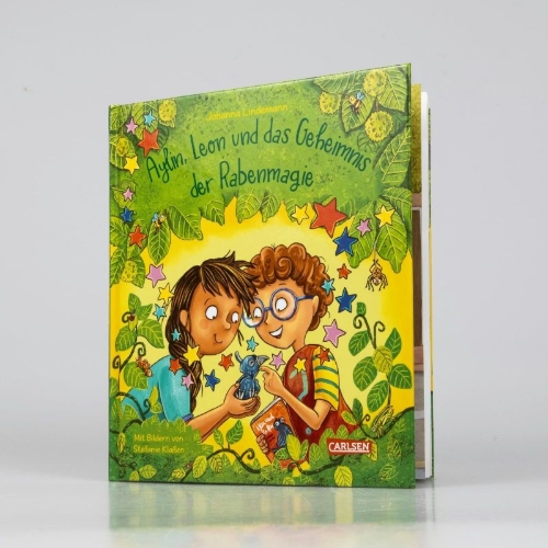 Buchcover und Innenansicht für das Buch: Aylin, Leon und das Geheimnis der Rabenmagie