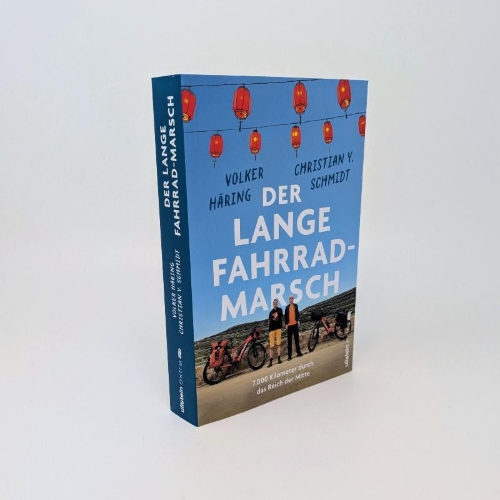 Buchcover und Innenansicht für das Buch: Der lange Fahrrad-Marsch