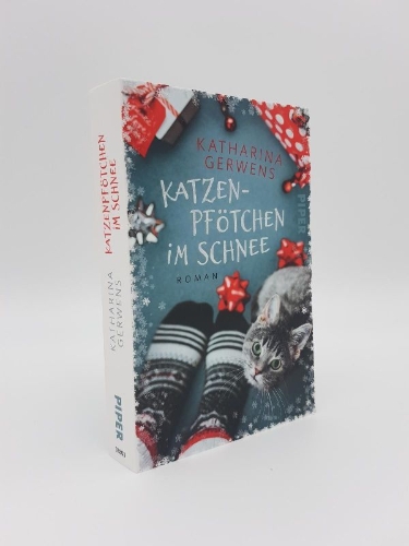 Buchcover und Innenansicht für das Buch: Katzenpfötchen im Schnee