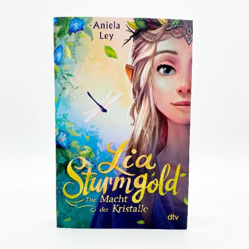 Buchcover und Innenansicht für das Buch: Lia Sturmgold - Die Macht der Kristalle
