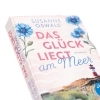 Buchcover und Innenansicht für das Buch: Das Glück liegt am Meer