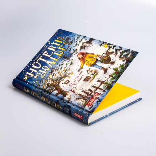 Buchcover und Innenansicht für das Buch: Hüterin des Waldes 4: Spuren im Schnee