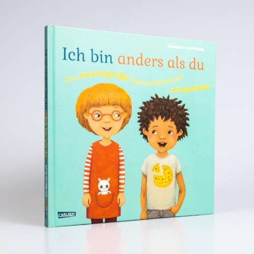 Buchcover und Innenansicht für das Buch: Ich bin anders als du - Ich bin wie du: Das riesengroße Wende-Bilderbuch mit Spieltipps