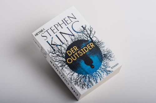 Buchcover und Innenansicht für das Buch: The Outsider
