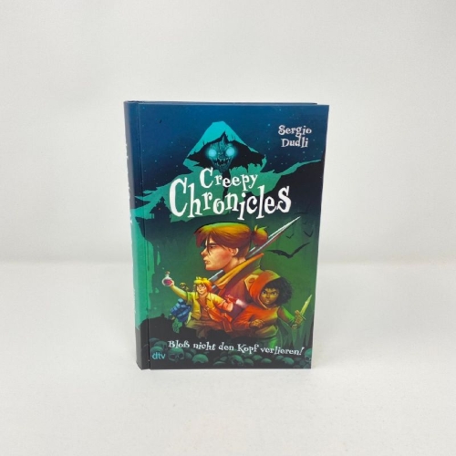 Buchcover und Innenansicht für das Buch: Creepy Chronicles - Bloß nicht den Kopf verlieren!