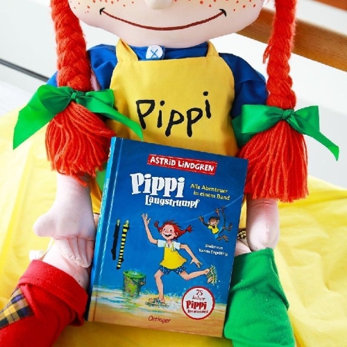 Buchcover und Innenansicht für das Buch: Boken om Pippi Långstrump