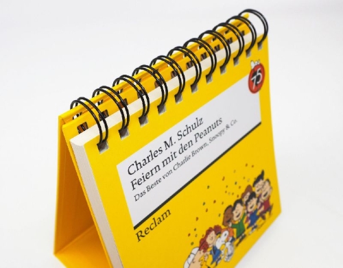 Buchcover und Innenansicht für das Buch: Feiern mit den Peanuts. Das Beste von Charlie Brown, Snoopy & Co.