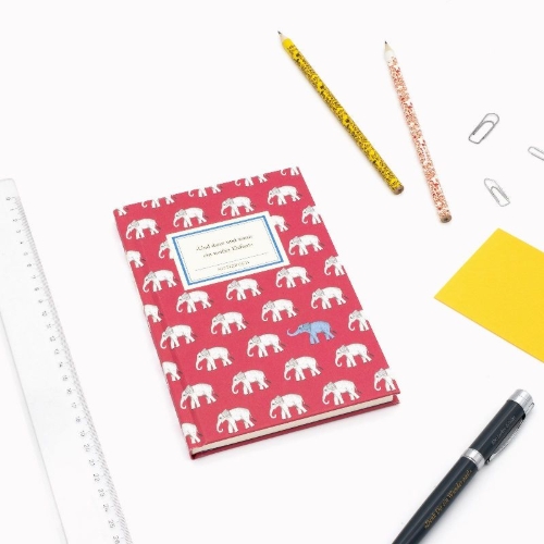 Buchcover und Innenansicht für das Buch: Notizbuch Insel-Bücherei 'Und dann und wann ein weißer Elefant'