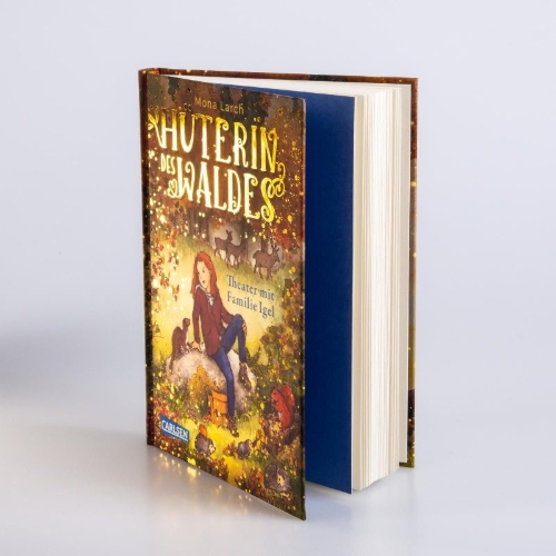 Buchcover und Innenansicht für das Buch: Hüterin des Waldes 3: Theater mit Familie Igel