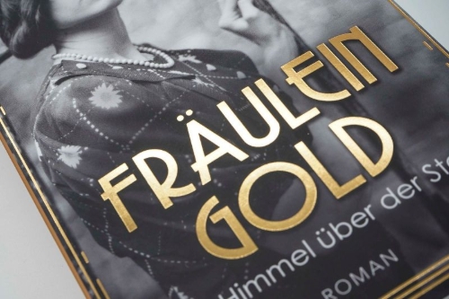 Buchcover und Innenansicht für das Buch: Fräulein Gold: Der Himmel über der Stadt