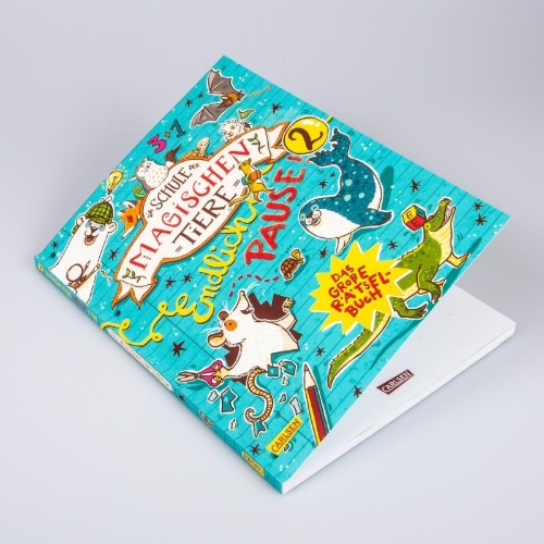 Buchcover und Innenansicht für das Buch: Die Schule der magischen Tiere: Endlich Pause! Das große Rätselbuch Band 2