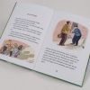 Buchcover und Innenansicht für das Buch: Ella ja kiristäjä