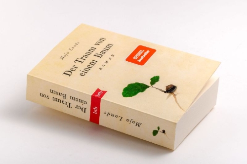 Buchcover und Innenansicht für das Buch: Drømmen om et tre
