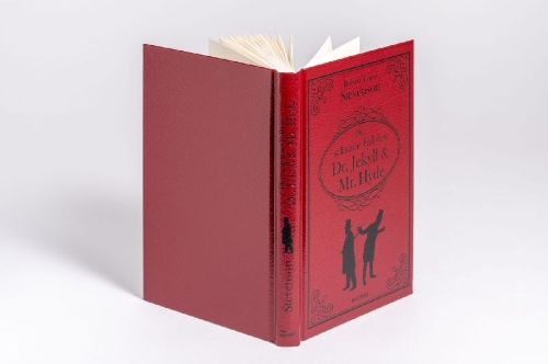 Buchcover und Innenansicht für das Buch: Der seltsame Fall des Dr. Jekyll und Mr. Hyde. Gebunden in Cabra-Leder