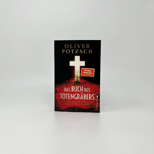 Buchcover und Innenansicht für das Buch: Das Buch des Totengräbers