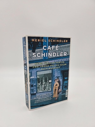 Buchcover und Innenansicht für das Buch: The Lost Café Schindler
