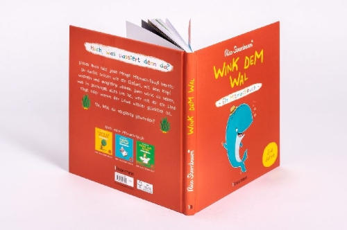 Buchcover und Innenansicht für das Buch: Wink dem Wal - Ein Mitmachbuch zum Schütteln, Schaukeln, Pusten, Klopfen und sehen, was dann passiert
