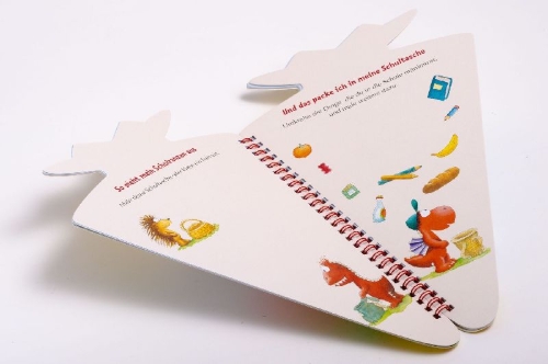Buchcover und Innenansicht für das Buch: Der kleine Drache Kokosnuss - Mein erster Schultag