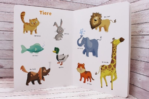 Buchcover und Innenansicht für das Buch: 100 erste Wörter, die mein Kind wissen muss