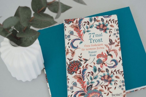 Buchcover und Innenansicht für das Buch: 77 mal Trost