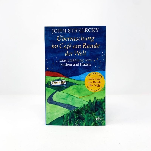 Buchcover und Innenansicht für das Buch: A New Visitor to The Cafe on the Edge of the World