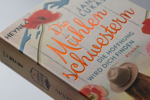 Buchcover und Innenansicht für das Buch: Die Mühlenschwestern - Die Hoffnung wird dich finden