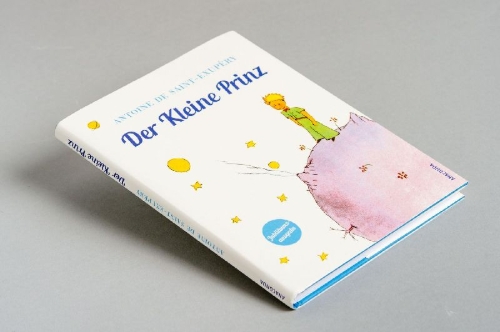 Buchcover und Innenansicht für das Buch: Antoine de Saint-Exupéry, Der Kleine Prinz (Geschenkausgabe mit Schutzumschlag)