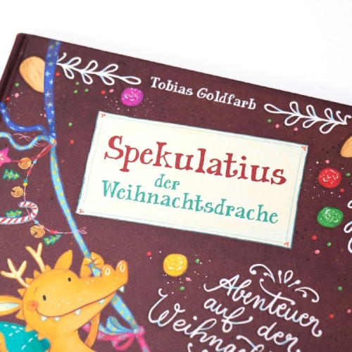 Buchcover und Innenansicht für das Buch: Spekulatius, der Weihnachtsdrache. Abenteuer auf der Weihnachtsinsel