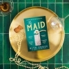 Buchcover und Innenansicht für das Buch: The Maid