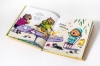 Buchcover und Innenansicht für das Buch: Wolly kann Würfel kacken